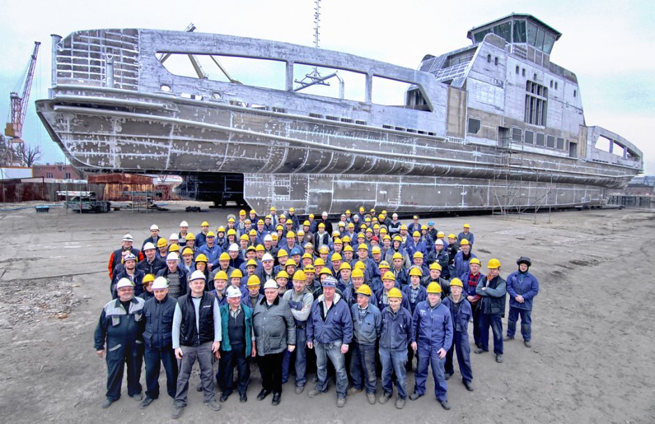Aluship Technology Team in front of 80m aluminium ferry hull